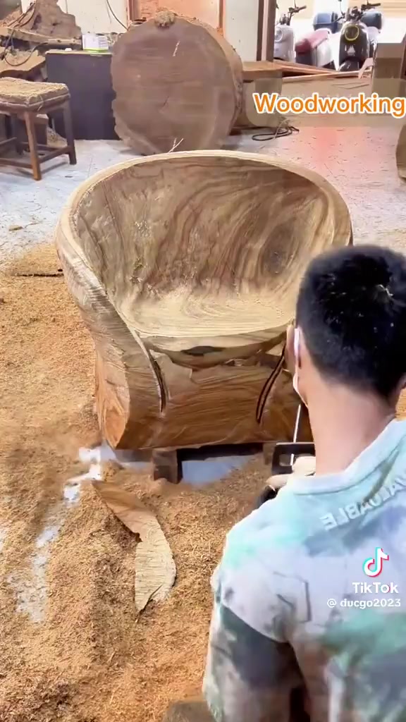 Science girl - Sculpting a chair from a solid piece of wood [1870790218023903232]